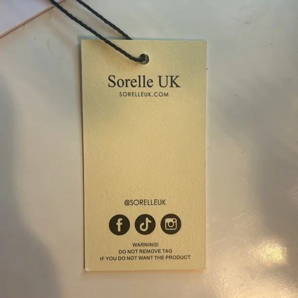 This dress is from SorelleUK! It is a size xs and in the color Peachy. - Picture 4 of 4